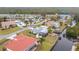 Aerial view of canal-front property and neighborhood at 141 Singapore Rd, Punta Gorda, FL 33950