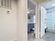 Clean bathroom with a shower/tub, vanity, and patterned shower curtain at 141 Singapore Rd, Punta Gorda, FL 33950