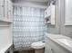 Clean bathroom with white vanity, shower, and updated fixtures at 141 Singapore Rd, Punta Gorda, FL 33950