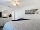 Bright bedroom featuring a comfortable bed and ample closet space at 141 Singapore Rd, Punta Gorda, FL 33950