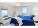 Charming bedroom with a dresser and a comfy bed at 141 Singapore Rd, Punta Gorda, FL 33950