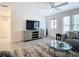 Living room with ample natural light and stylish furnishings at 141 Singapore Rd, Punta Gorda, FL 33950
