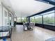Spacious screened patio, great for outdoor dining and entertaining at 141 Singapore Rd, Punta Gorda, FL 33950