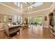 Large living room with high ceilings and hardwood floors at 1748 Highland Oaks Blvd, Lutz, FL 33559