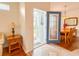 Bright entryway with tiled floor, dining area visible at 2071 Sifield Greens Way # 103, Sun City Center, FL 33573