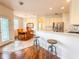 Kitchen with white cabinets, stainless steel appliances at 2071 Sifield Greens Way # 103, Sun City Center, FL 33573