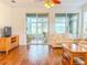 Living room with view of screened-in patio at 2071 Sifield Greens Way # 103, Sun City Center, FL 33573