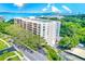 Aerial view of the building and its waterfront location at 220 Belleview Blvd # 811, Belleair, FL 33756