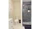 Clean bathroom, featuring a toilet, vanity, and a large shower at 2910 W Burke St, Tampa, FL 33614