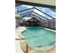 Inviting screened pool area, perfect for relaxation at 2910 W Burke St, Tampa, FL 33614