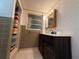 Clean bathroom with shower/tub combo and updated vanity at 3090 Arrowhead Rd, Venice, FL 34293