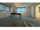 Spacious bedroom with a large desk and carpet at 3090 Arrowhead Rd, Venice, FL 34293
