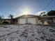 Ranch-style home with double garage and carport at 3090 Arrowhead Rd, Venice, FL 34293