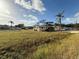 Ranch home with a large grassy yard at 3090 Arrowhead Rd, Venice, FL 34293