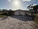 Ranch home with two-car garage and covered patio at 3090 Arrowhead Rd, Venice, FL 34293