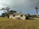 Ranch-style home with side yard at 3090 Arrowhead Rd, Venice, FL 34293