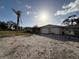 Ranch home with two-car garage and gravel driveway at 3090 Arrowhead Rd, Venice, FL 34293