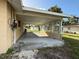 Ranch-style home with carport and spacious yard at 3090 Arrowhead Rd, Venice, FL 34293