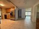 Kitchen with stainless steel refrigerator and wood cabinets at 3090 Arrowhead Rd, Venice, FL 34293