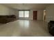 Living room with sofa and access to other rooms at 3090 Arrowhead Rd, Venice, FL 34293