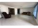 Living room with comfy seating and large window at 3090 Arrowhead Rd, Venice, FL 34293