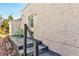 Small back patio with two chairs and steps at 3147 Prescott N St, St Petersburg, FL 33713