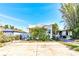 Front view of charming bungalow with front patio and landscaping at 3147 Prescott N St, St Petersburg, FL 33713