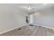 Living room with hardwood floors, offering view of kitchen at 3147 Prescott N St, St Petersburg, FL 33713