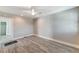 Spacious living room with hardwood floors and ceiling fan at 3147 Prescott N St, St Petersburg, FL 33713