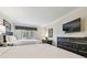 Hotel bedroom with two beds, dark wood furniture, and a large flat screen TV at 36750 Us Highway 19 # 24209, Palm Harbor, FL 34684