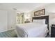Hotel bedroom with two beds, an armchair, and a doorway to a closet at 36750 Us Highway 19 # 24209, Palm Harbor, FL 34684