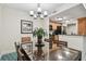Well-lit dining space adjacent to a modern kitchen, perfect for entertaining guests at 36750 Us Highway 19 # 24209, Palm Harbor, FL 34684