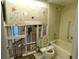 Bathroom under renovation, toilet and bathtub visible at 4708 Lacrosse Ct, New Port Richey, FL 34655