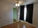 Bright bedroom with large window, closet and wood floor at 4708 Lacrosse Ct, New Port Richey, FL 34655