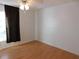 Bedroom with window, closet and wood floor at 4708 Lacrosse Ct, New Port Richey, FL 34655