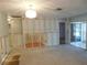 Renovation in progress, features a sliding glass door and chandelier at 4708 Lacrosse Ct, New Port Richey, FL 34655