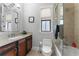 Elegant bathroom with soaking tub, shower, and modern vanity at 4902 Carranza Ct, Tampa, FL 33616