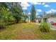 Large backyard with patio, grassy area, and storage shed at 520 Bryan Valley Ct, Brandon, FL 33511