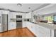 Updated kitchen featuring white cabinets and quartz countertops at 520 Bryan Valley Ct, Brandon, FL 33511