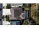 Aerial view of house with pool and backyard at 5709 Camila Song Ln, Tampa, FL 33625