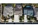 Aerial view of houses with pools and driveways at 5709 Camila Song Ln, Tampa, FL 33625