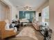 Bright living room with piano and comfy seating at 5709 Camila Song Ln, Tampa, FL 33625