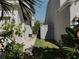 Side yard with gate providing access to the backyard at 5709 Camila Song Ln, Tampa, FL 33625