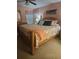 Bright bedroom with king-size bed and coastal decor at 6070 Shearwater Dr, Englewood, FL 34224