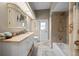 Updated bathroom with tub, shower, and vanity with plenty of storage at 628 Erin Way, Brooksville, FL 34601