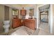 Updated bathroom with double vanity, large mirror, and separate shower at 628 Erin Way, Brooksville, FL 34601