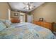 Spacious main bedroom with a comfortable bed and ample storage at 628 Erin Way, Brooksville, FL 34601