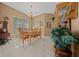 Dining room with wood table, chairs, and a chandelier at 628 Erin Way, Brooksville, FL 34601