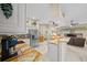 Large kitchen with granite countertops, stainless steel appliances and an island at 628 Erin Way, Brooksville, FL 34601