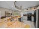 Modern kitchen boasts granite countertops and stainless steel appliances at 628 Erin Way, Brooksville, FL 34601